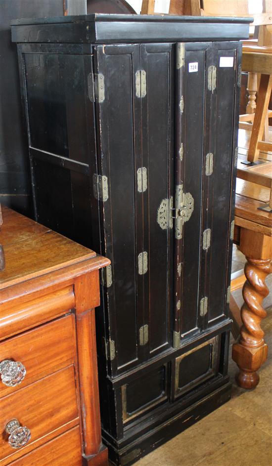 Ebonised cabinet with Icon inside